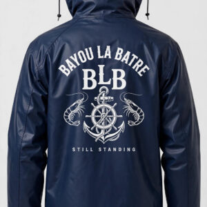 Navy insulated slicker back view with BAYOU LA BATRE arched, BLB monogram, anchor ship's wheel emblem flanked by two shrimp, STILL STANDING beneath